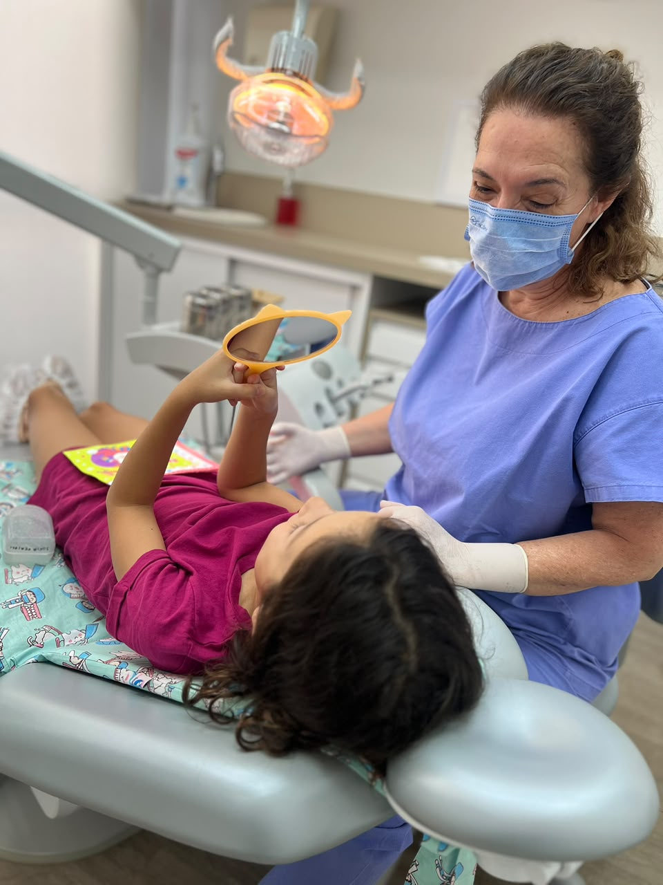 Atendimento odontopedi&aacute;trico na D&iacute;ade Odontologia
